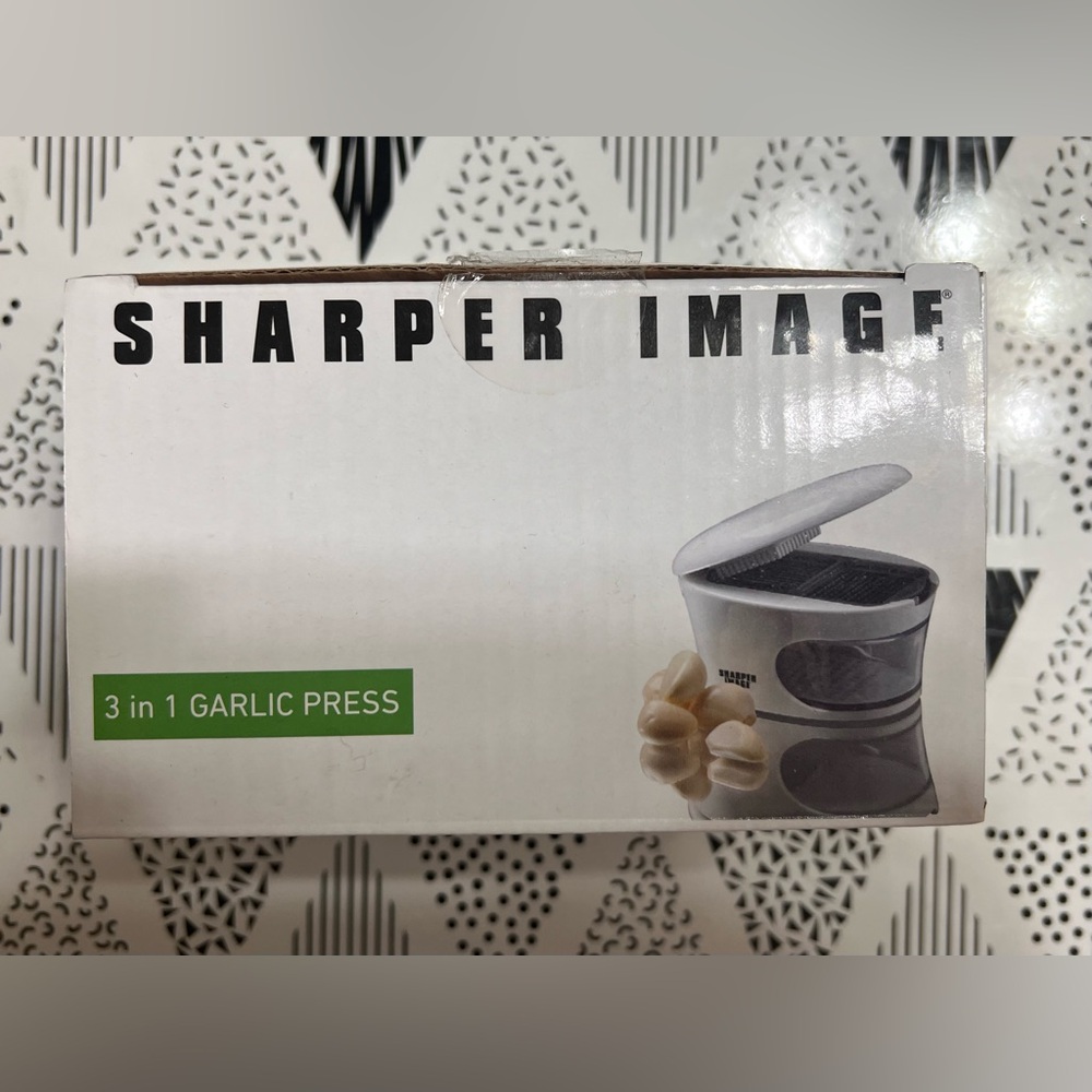 Sharper Image Garlic Press